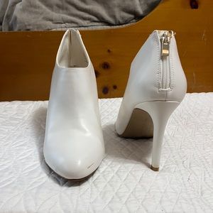 White heeled booties